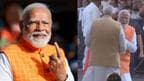 PM Modi touches elder brother feet before casting vote