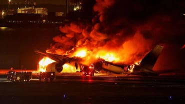Japan Plane Fire/ AP