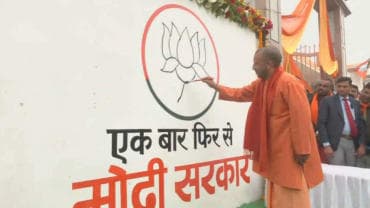 CM Yogi Adityanath paints party symbol Lotus
